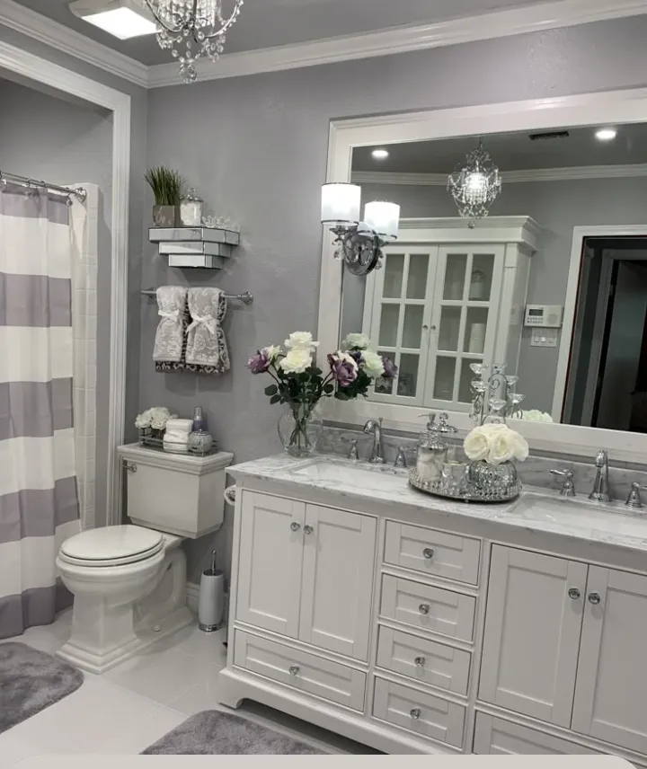 Bright bathroom vanity, mirror and floors, spotless, cleaned by Tidy Up Solutions Cleaning Services in the Phoenix area