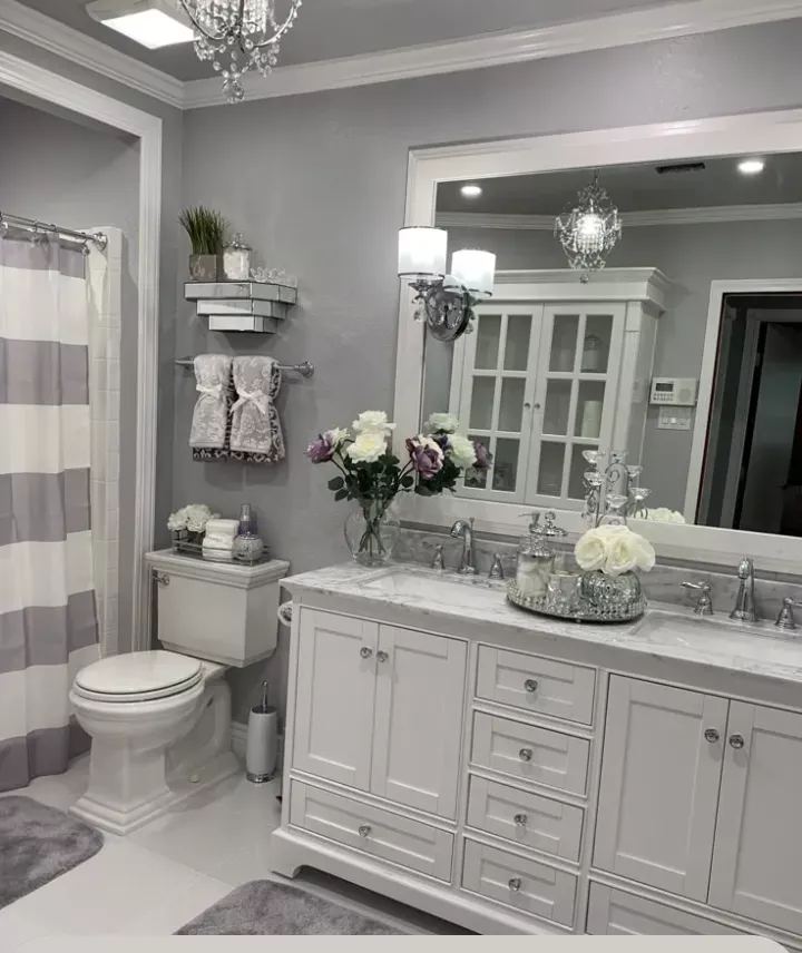 Bright bathroom vanity, mirror and floors, spotless, cleaned by Tidy Up Solutions Cleaning Services in the Phoenix area