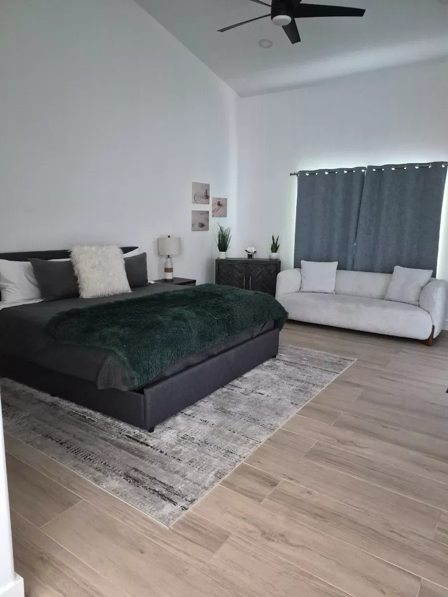 Bedroom floors swept, mopped and streak-free, cleaned by Tidy Up Solutions Cleaning Services in the Phoenix area