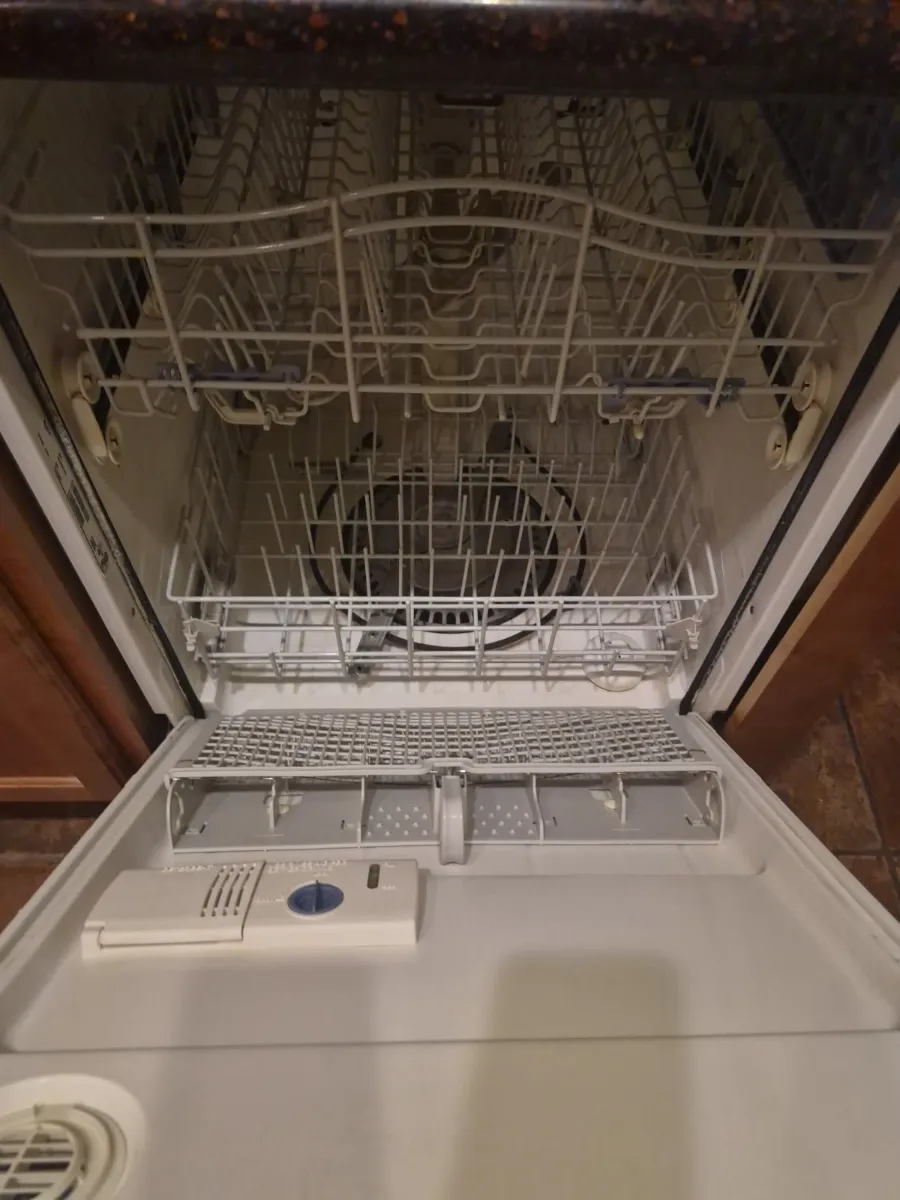 Dishwasher cleaned inside, racks and all, cleaned by Tidy Up Solutions Cleaning Services in the Phoenix area