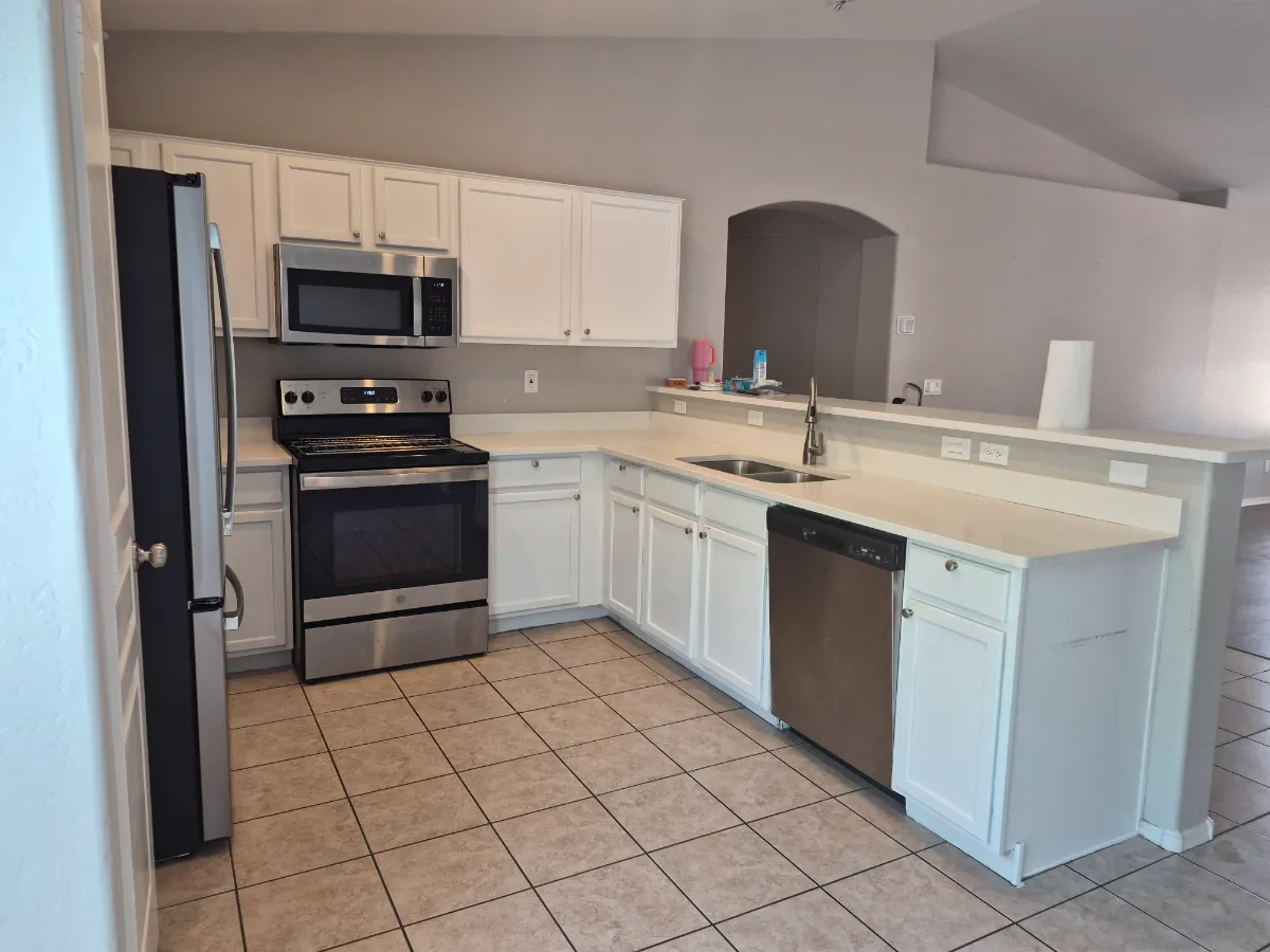Counters, tile floors and appliances, cleaned top to bottom, cleaned by Tidy Up Solutions Cleaning Services in the Phoenix area