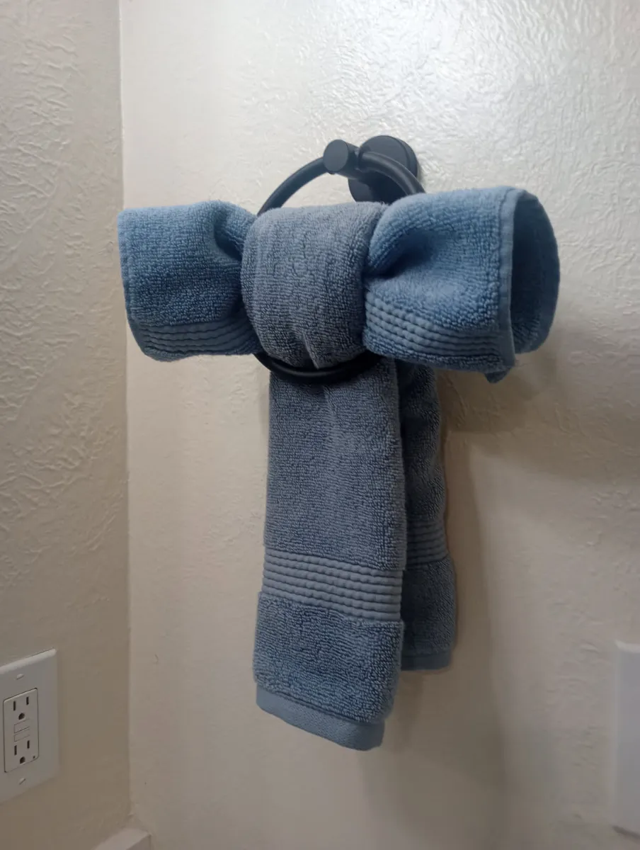 Little finishing touches, like a towel tied with care, cleaned by Tidy Up Solutions Cleaning Services in the Phoenix area