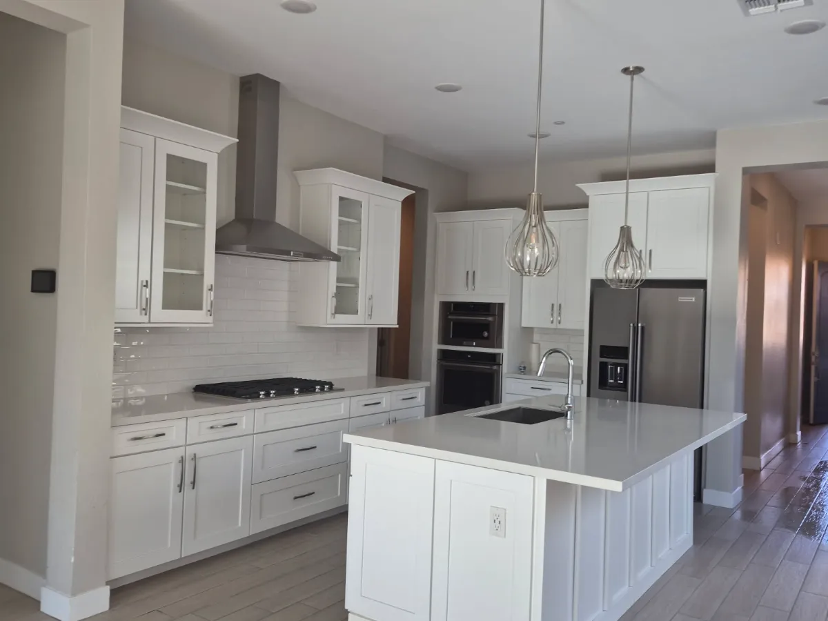 White kitchen wiped down from range hood to floor, cleaned by Tidy Up Solutions Cleaning Services in the Phoenix area
